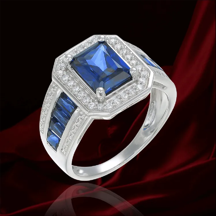 Emerald Cut Sapphire Accented Ring